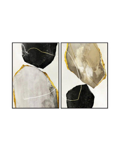 Modern minimalist abstract triptych wall art set featuring textured geometric lines, concentric half circles, and stripes in beige, white, and black with slim gold frames hanging side by side on a neutral living room wall.