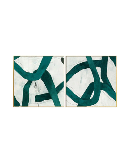 Modern minimalist abstract diptych wall art featuring bold, sweeping emerald green loops and intersecting bands over a textured white canvas with gold frames.