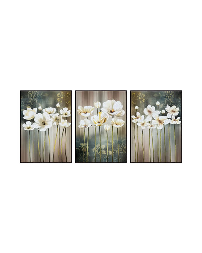 Modern minimalist abstract triptych canvas prints featuring elegant white blossom flowers with slender gold stems, vertical textured background stripes, and damask floral stencils in cream, beige, brown, and muted teal green.